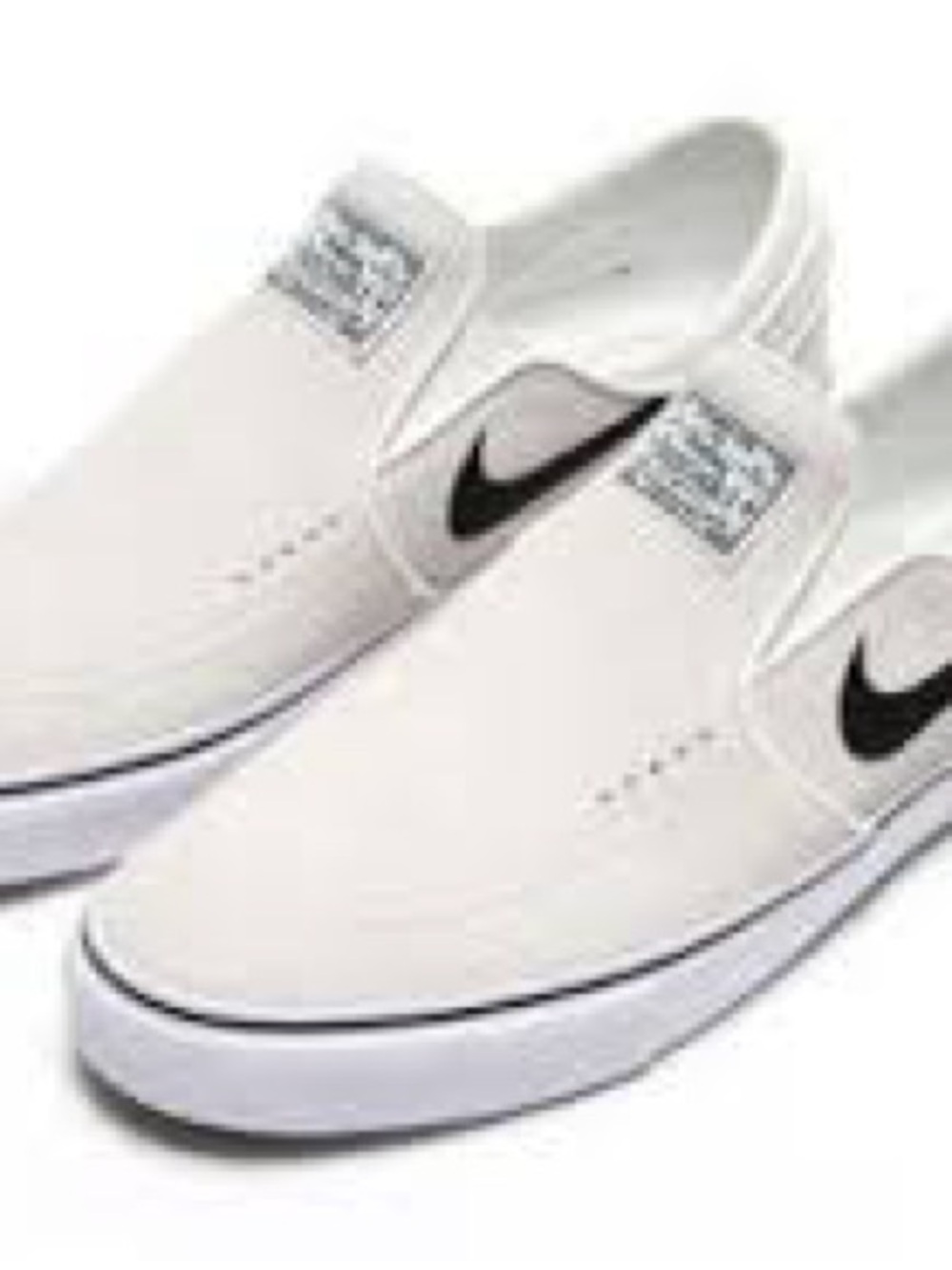 Nike Stefan janowski + slip SB White Slip-On Sneakers with Black Swoosh Accent